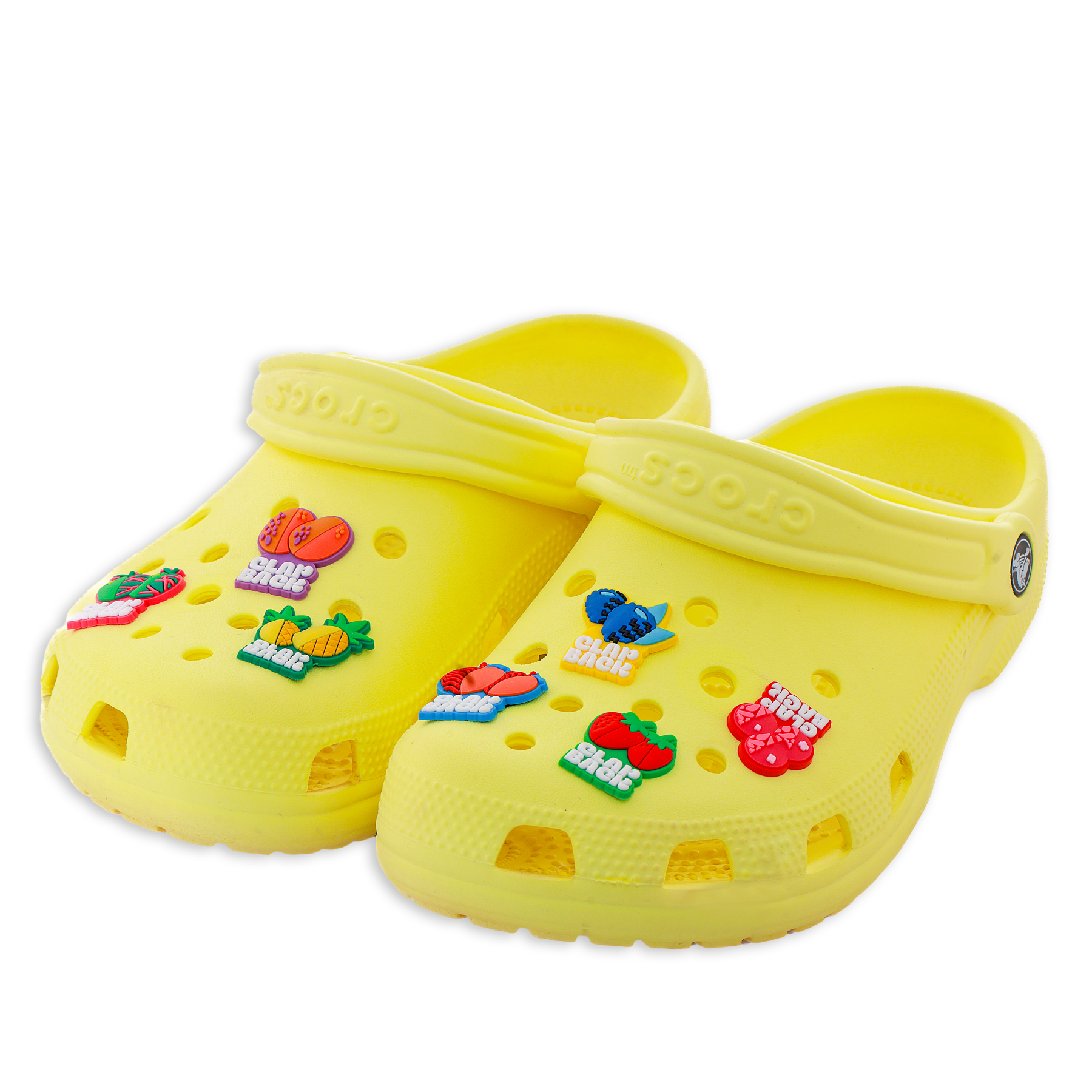 Yellow clogs with colorful character stickers on a white background
