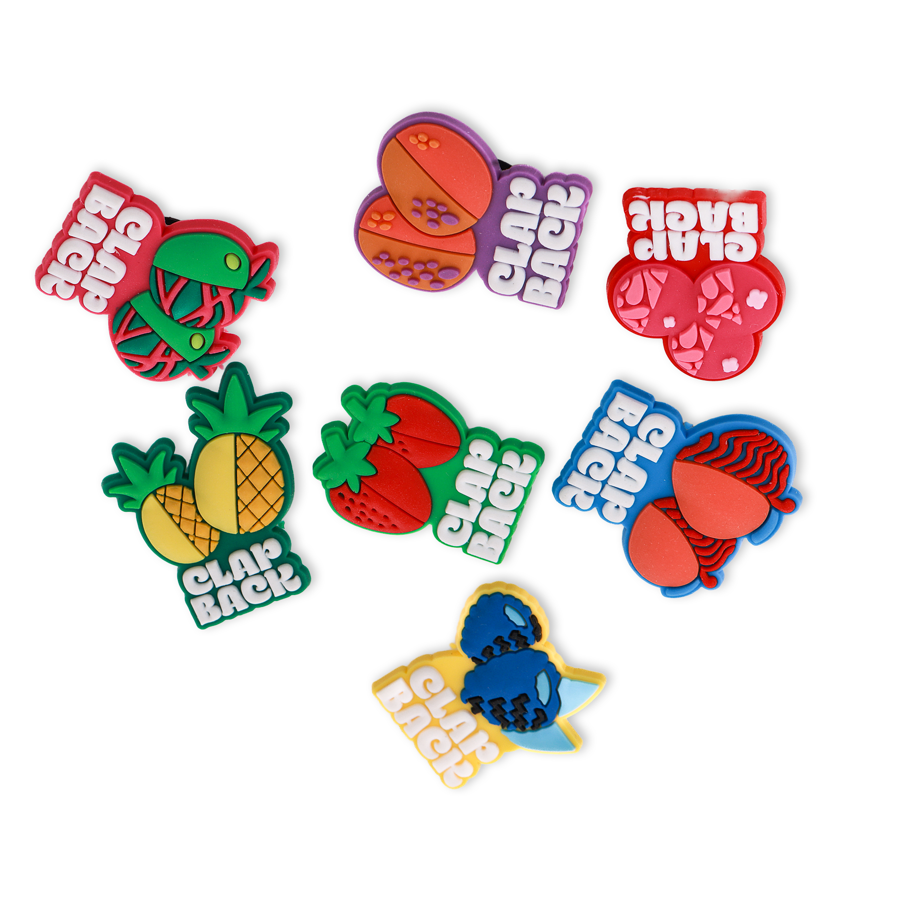 Colorful rubber stamps with various designs and text on a white background