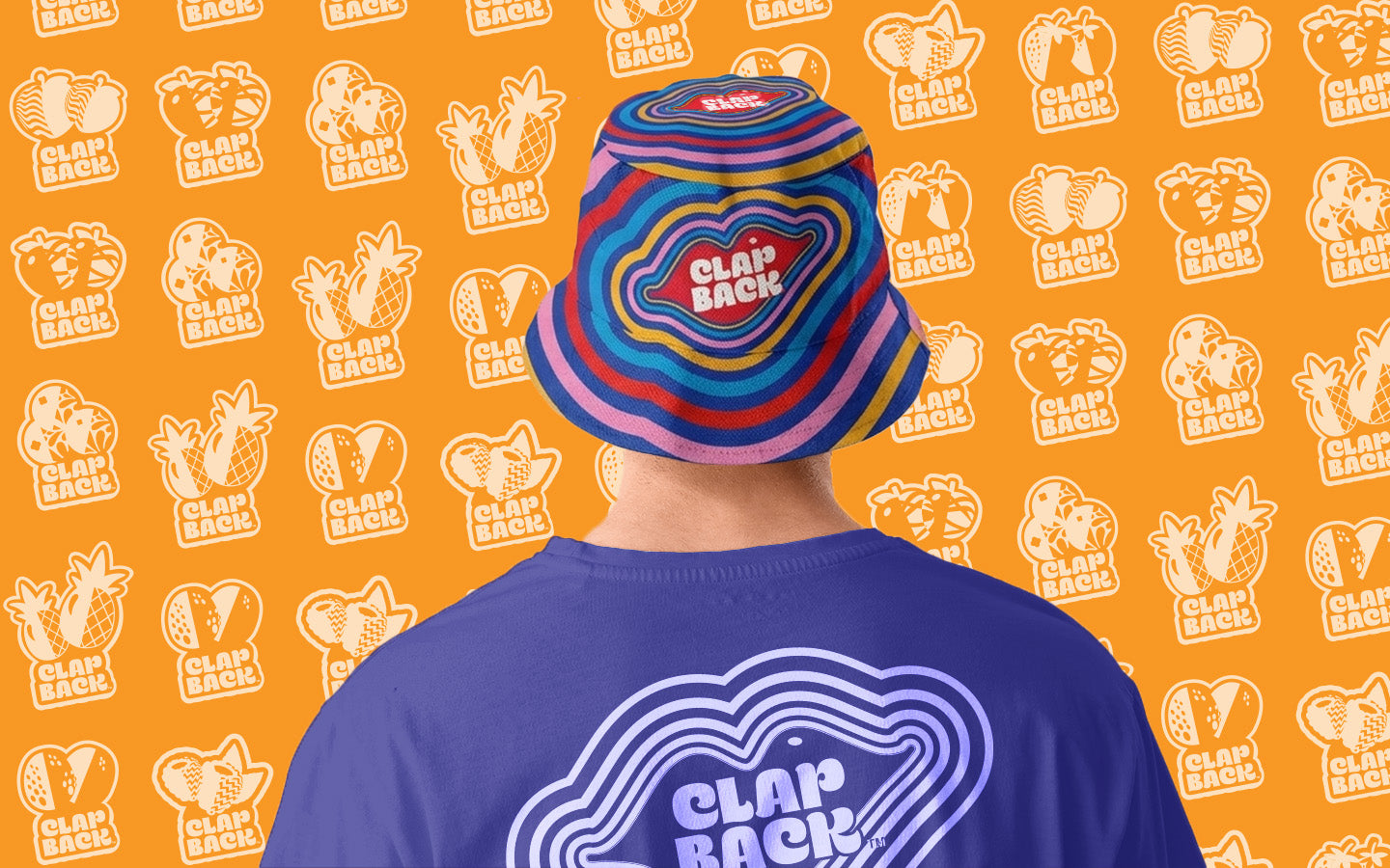 Person wearing a colorful bucket hat and blue t-shirt with ClapBack logo on an orange background with brand pattern.