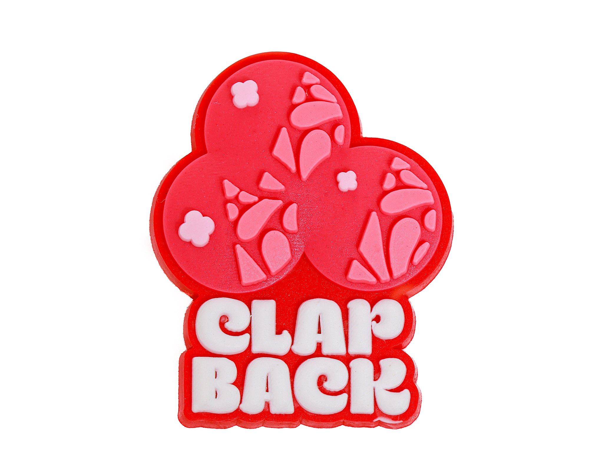 Red and pink decorative item with 'CLAP BACK' text on a white background